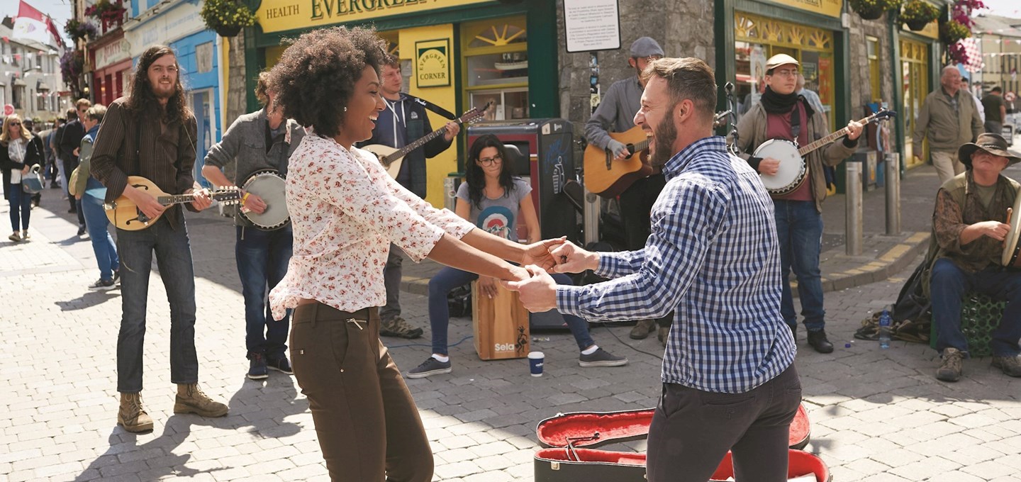 Couple dancing in streets of Galway